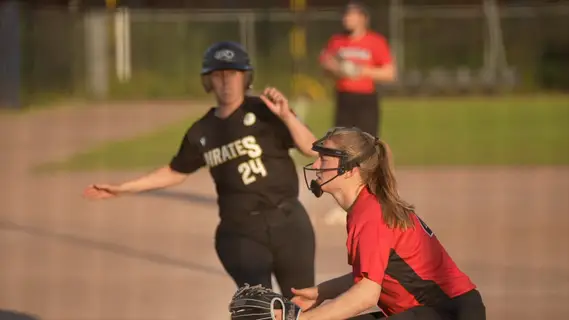 Kelsy Pieneman slides into home