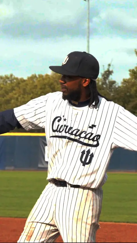 Gregory Trinidad walks onto the field