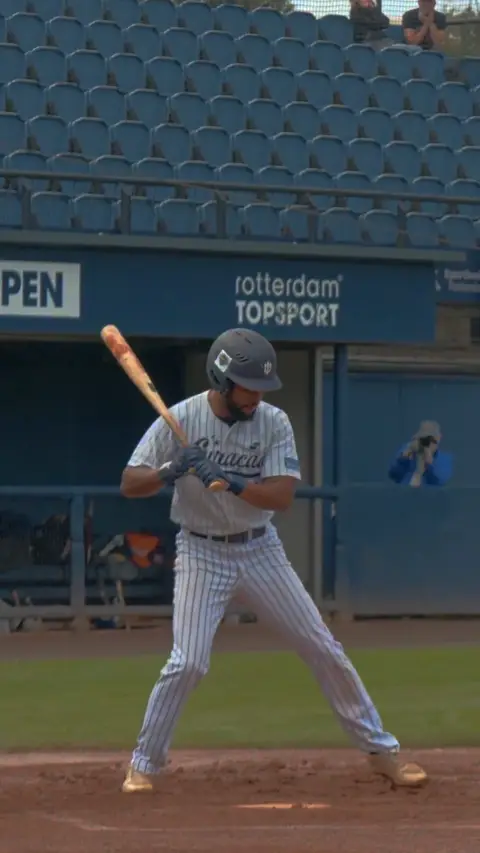 Jovaughn Viotty walks to first base
