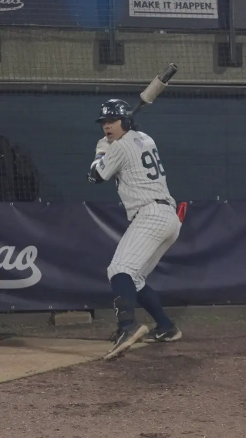 Kyan Beer walks to the plate