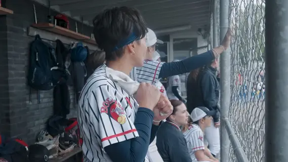 Giulia Longhi timing pitches in the dugout