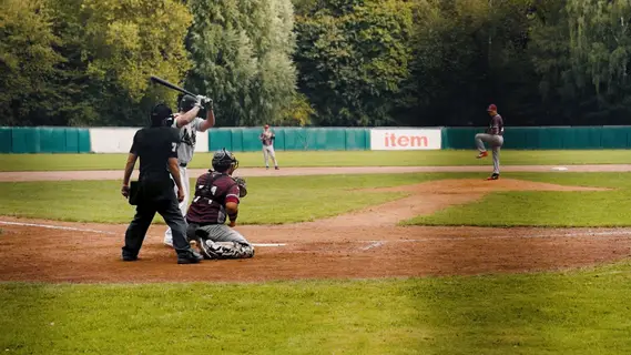 Nicolas König sliding into 3rd base on error