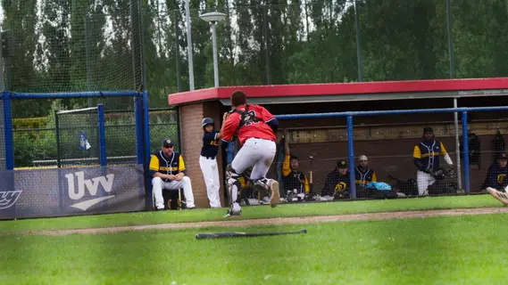 Raylano making an athletic throw from behind the plate