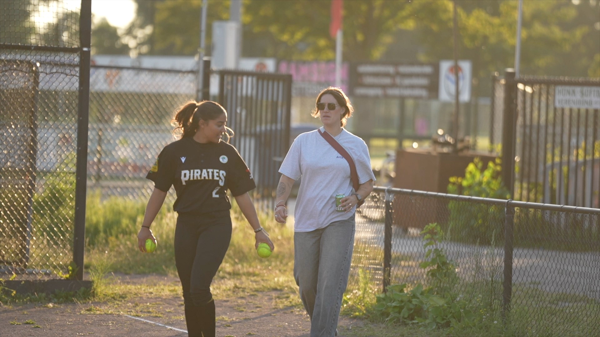 Melany Aguilera Zayas and Lisa Mirani walking