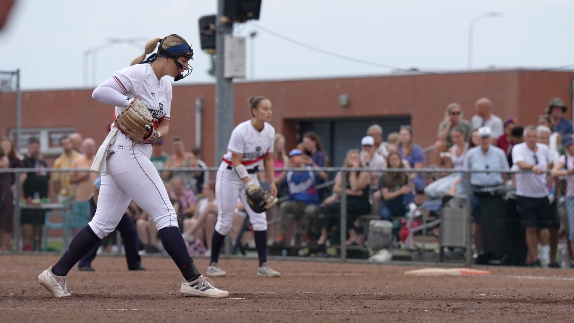 Esmee Ames pitching (side view)