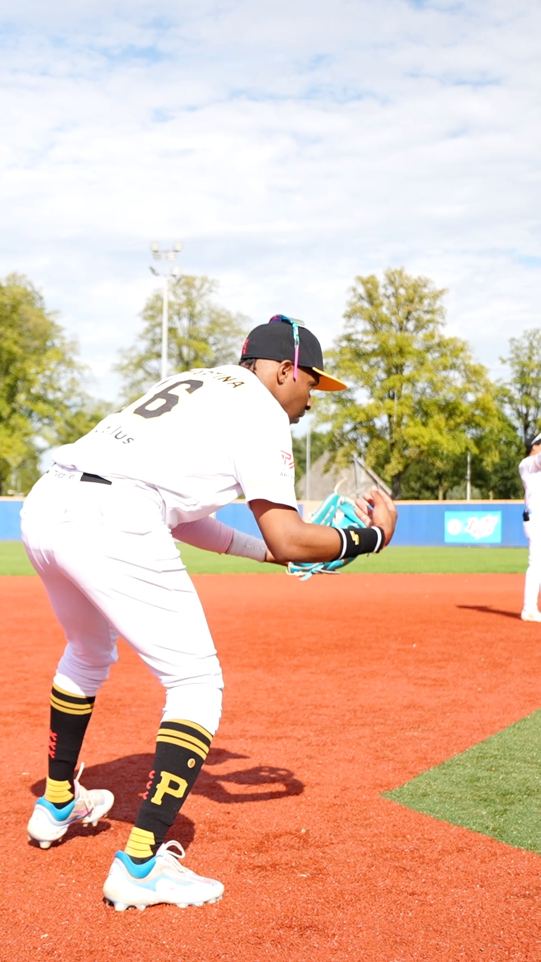 Brendly warms up at third base