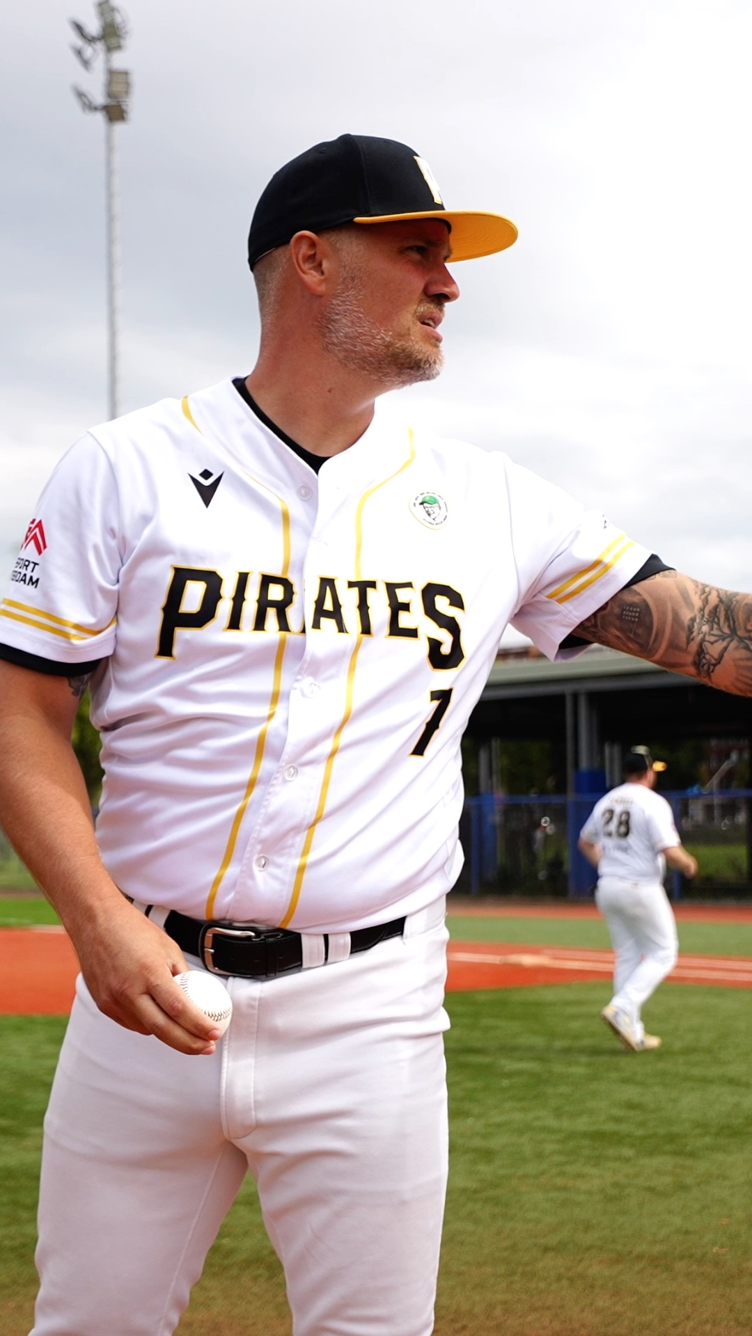 Dennis Burgersdijk warms up to pitch