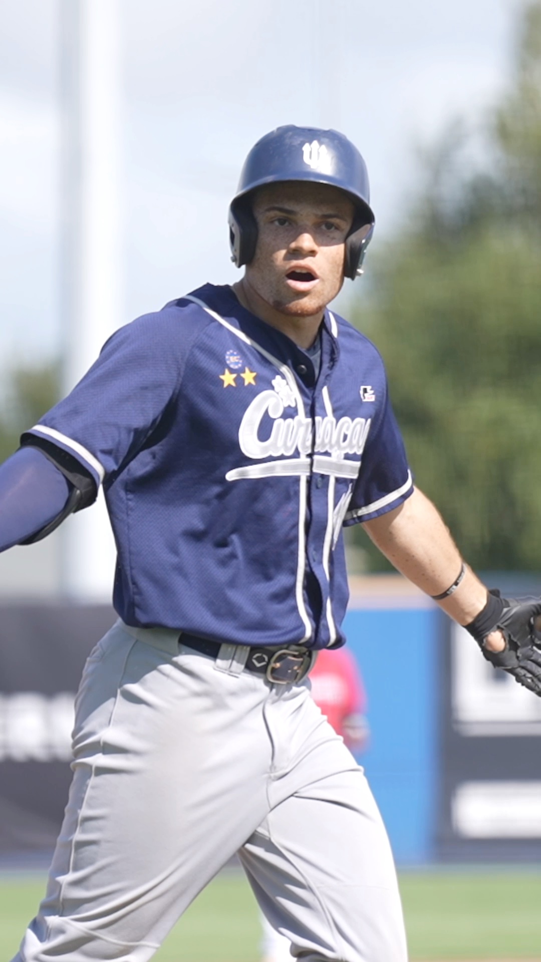Darryl Collins walks the bases after a homerun