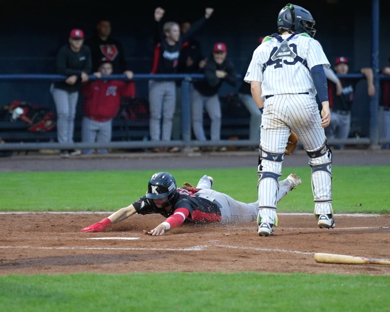 Nick Hofer slides into home