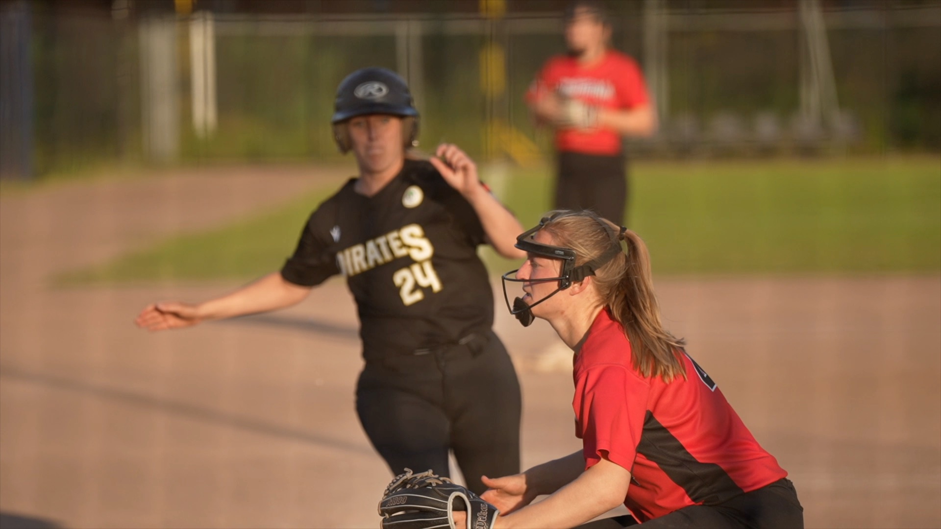 Kelsy Pieneman slides into home