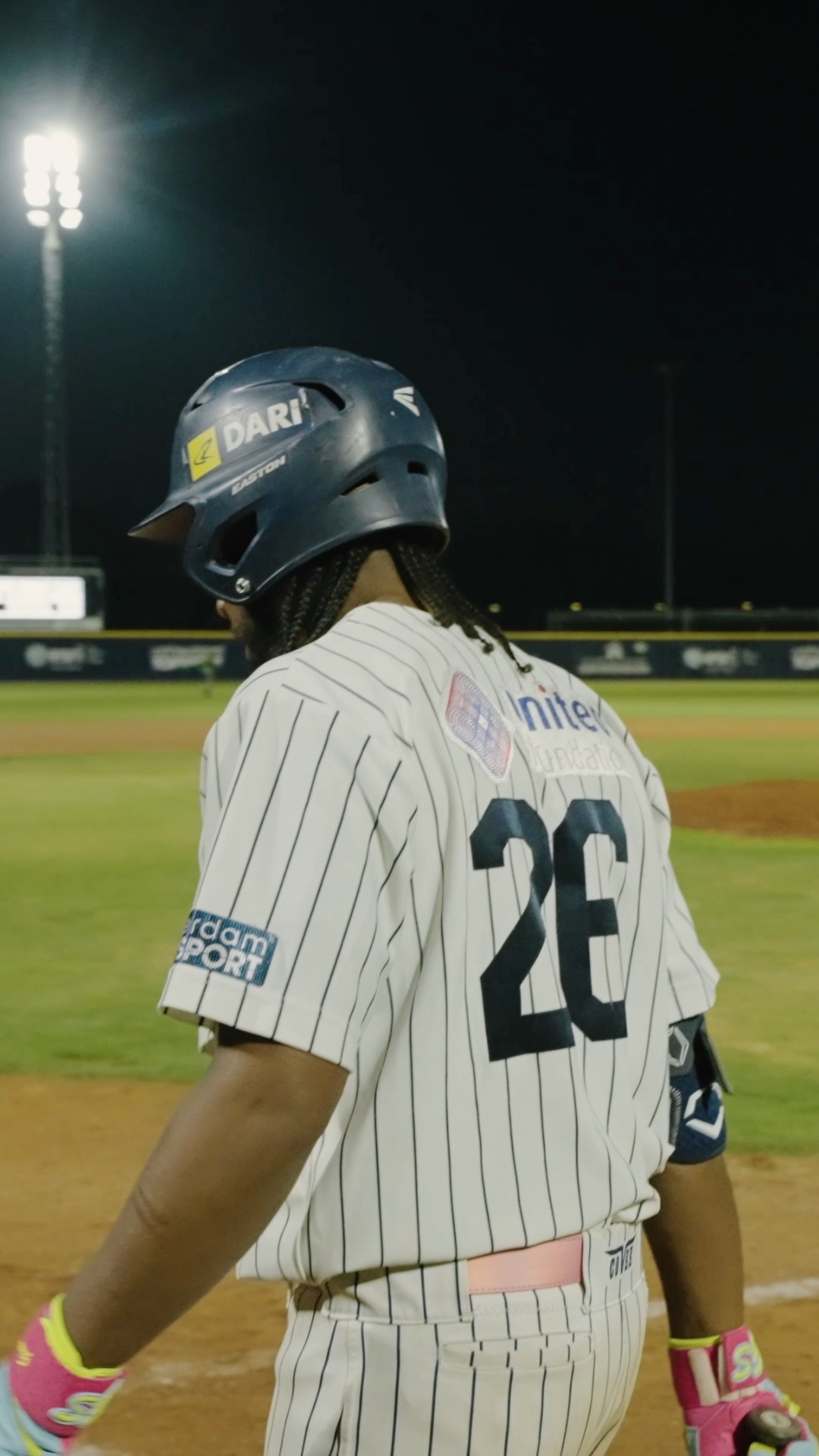 Gregory Trinidad walks to homeplate