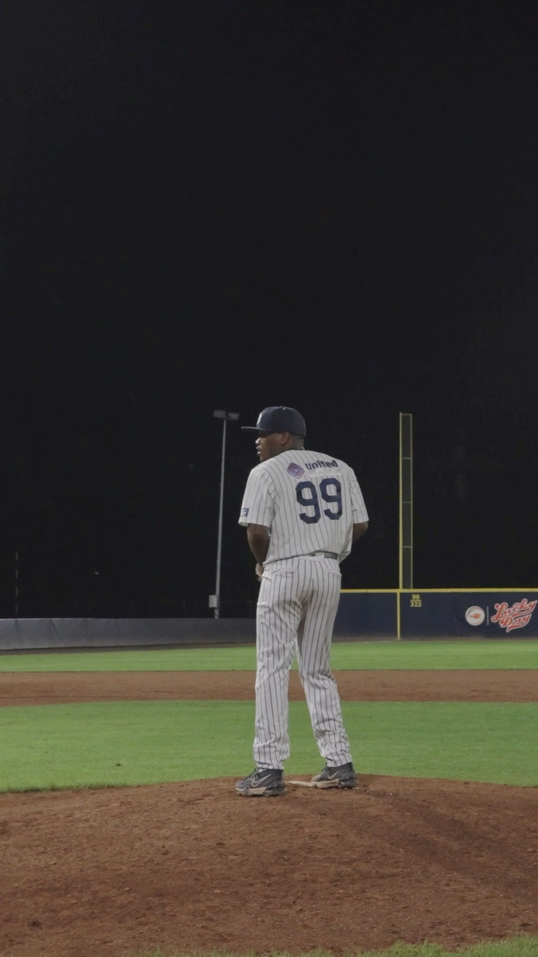Joshua Leito throws last warm up pitch for Louie Jay Sienders to throw to 2B