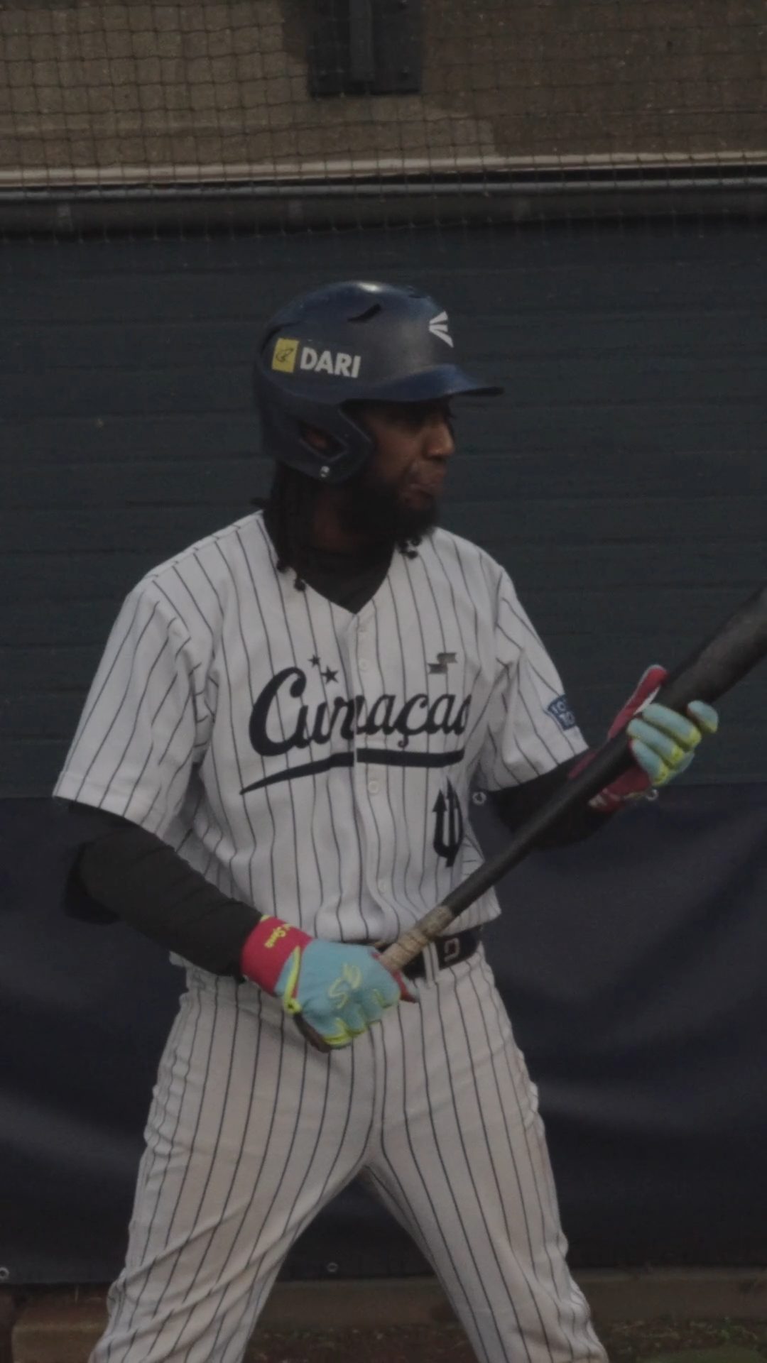 Gregory Trinidad walks up to the plate