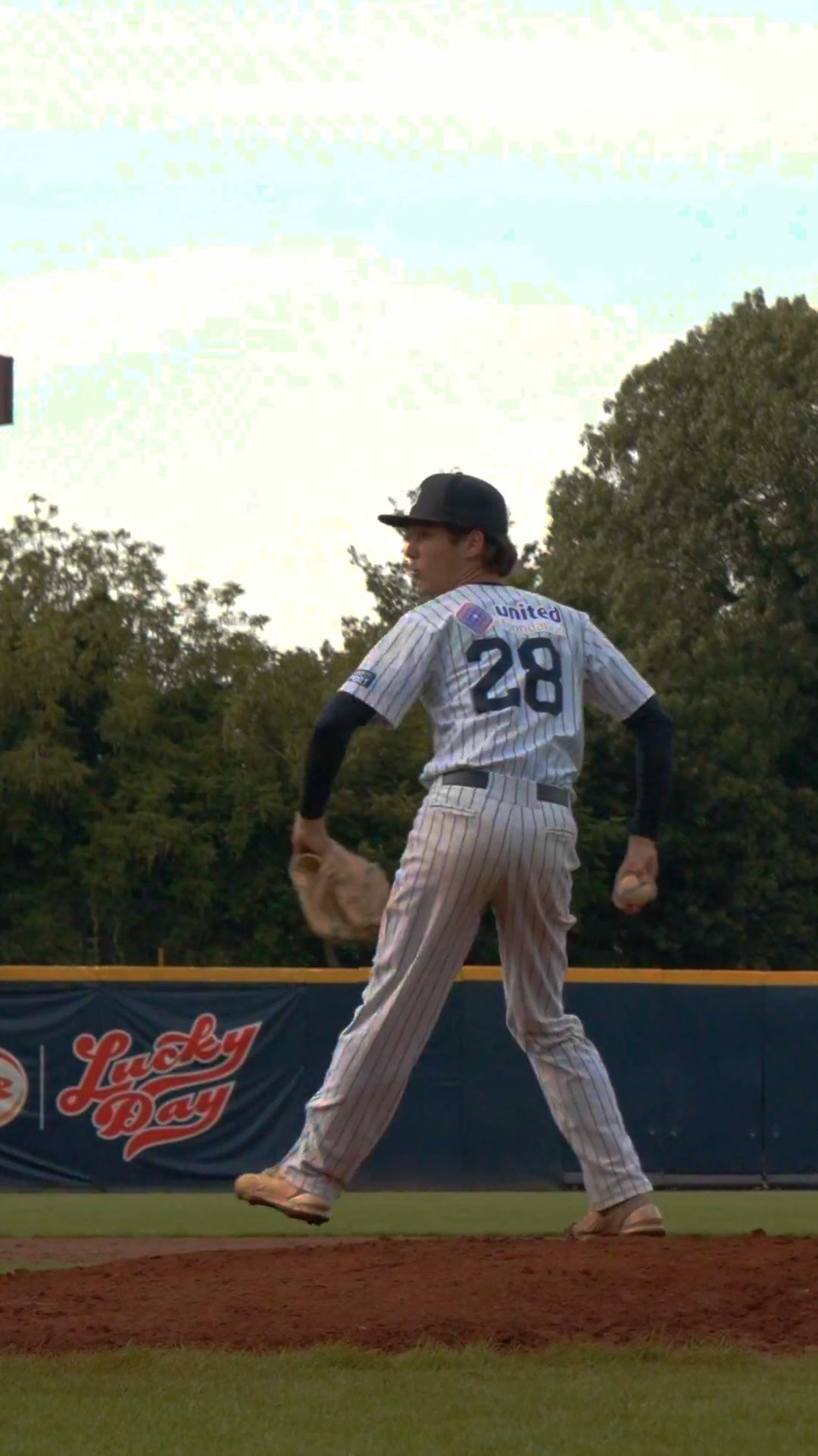 Rosario Campisano warms up to pitch