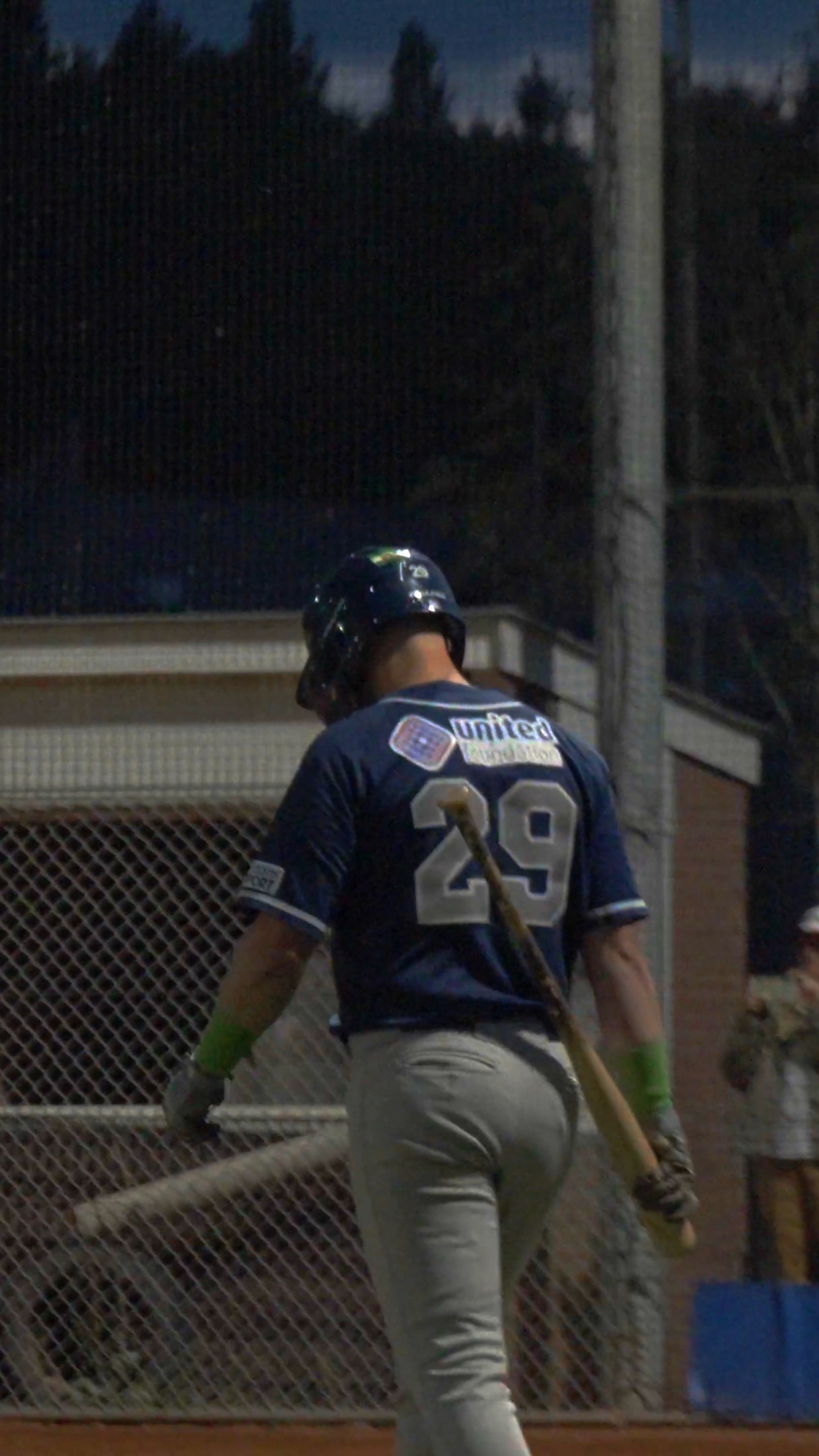 Hugo Rijkenhuizen walks up to the plate after sundown
