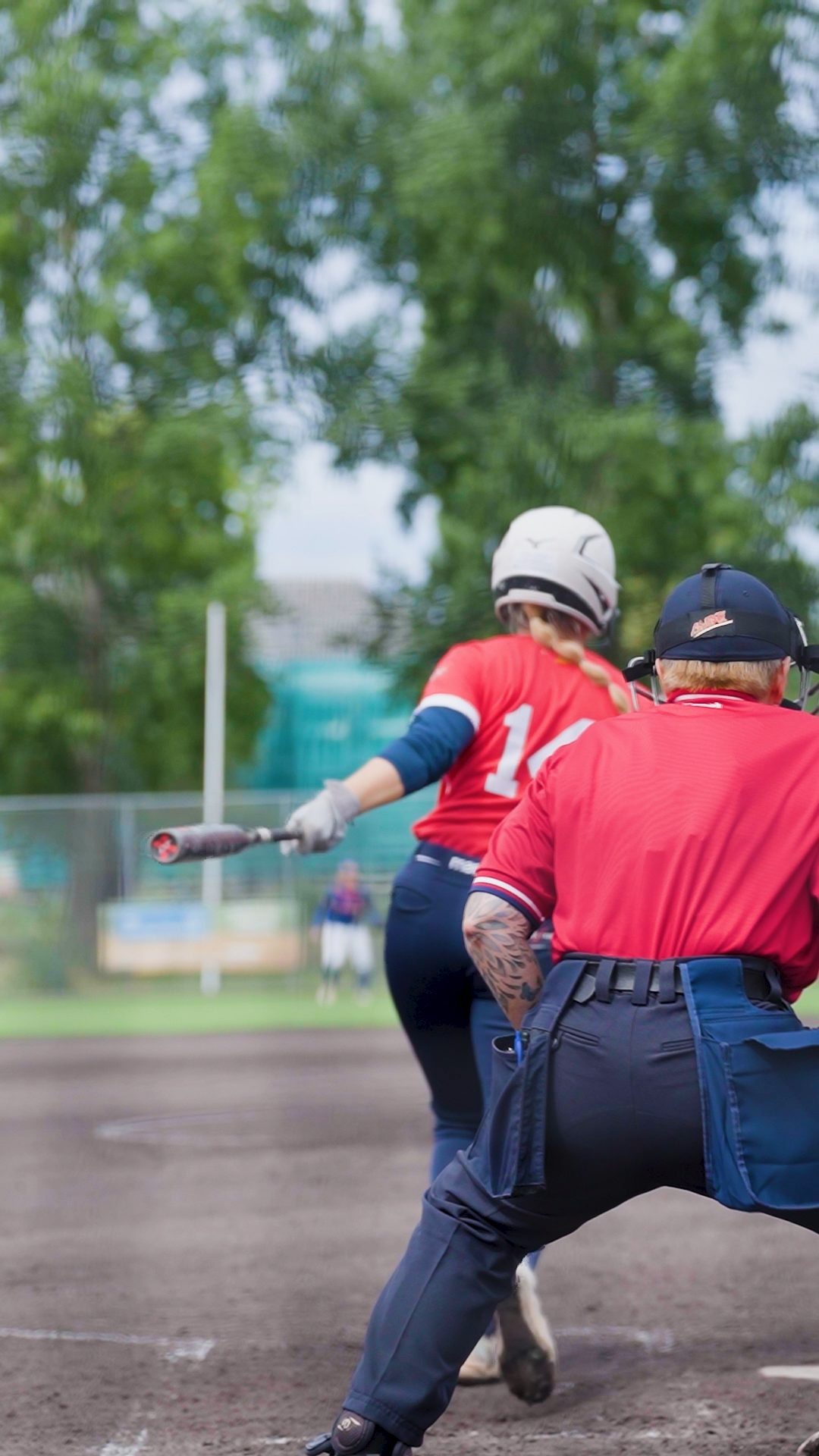 Lory Lamieri calls strike behind homeplate