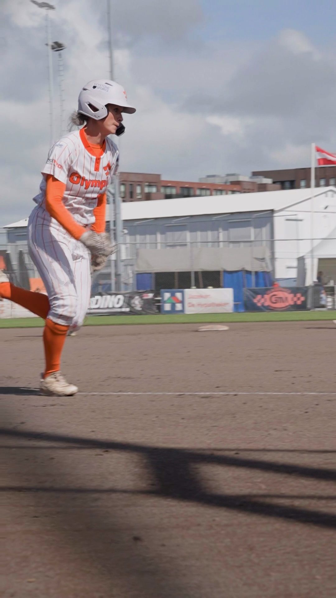 Cindy Van Der Zanden slinding home and celebrating