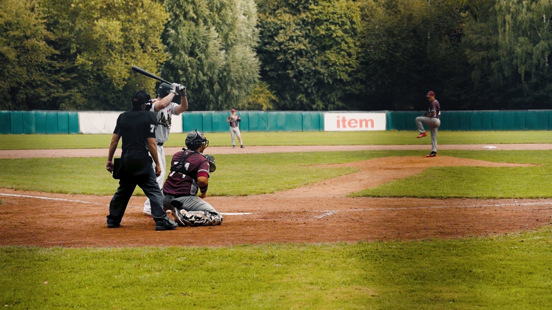 Nicolas König sliding into 3rd base on error
