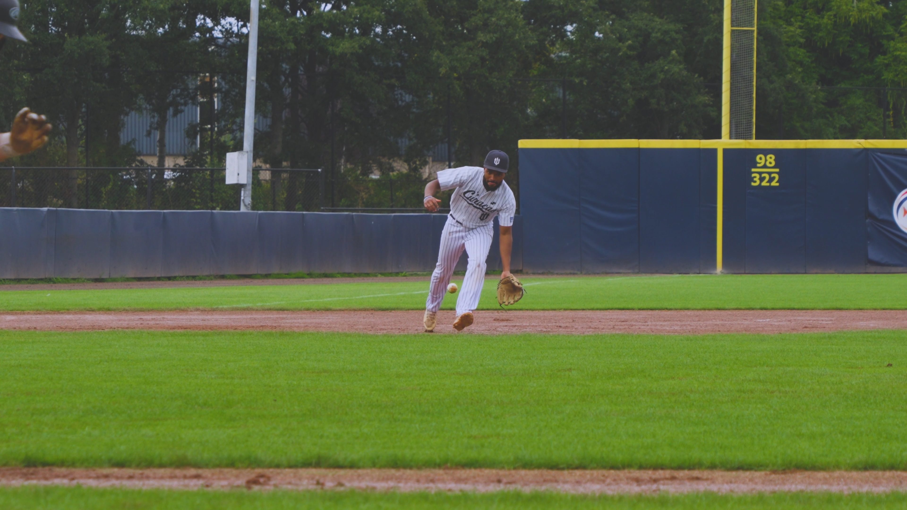 Jovaughn Viotty makes an off balance throw to get the out at first